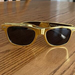 Gold rimed sunglasses
